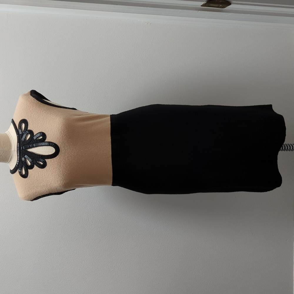 Tory Burch black and tan sweater dress.